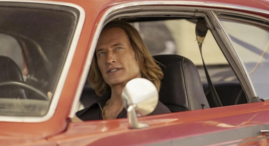 ‘Duster’ Episode 5 Review: Family, Firepower & False Friends - A Soul-Soaked Sprint Through Love and Lies 2 Josh Holloway driving a car in a scene from Duster.