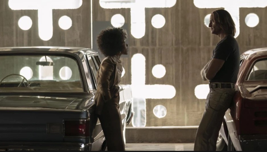 ‘Duster’ Episode 5 Review: Family, Firepower & False Friends - A Soul-Soaked Sprint Through Love and Lies 1 Josh Holloway and Rachel Hilson engaged in a conversation in a scene from Duster.