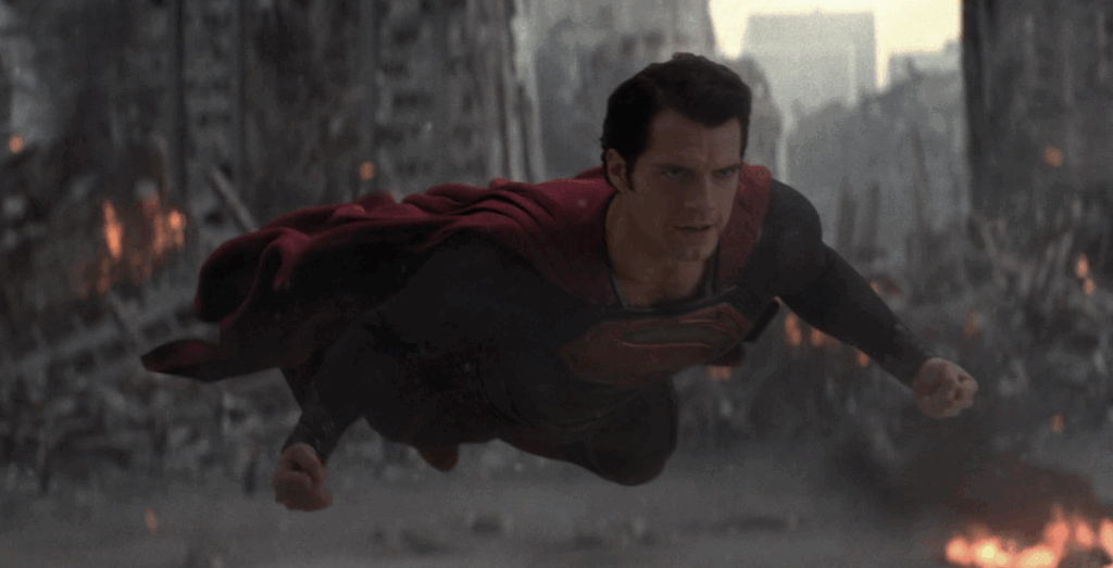 11 Things You Did Not Know About Superman’s Suit 4 Superman is flying across a heavily damaged city.