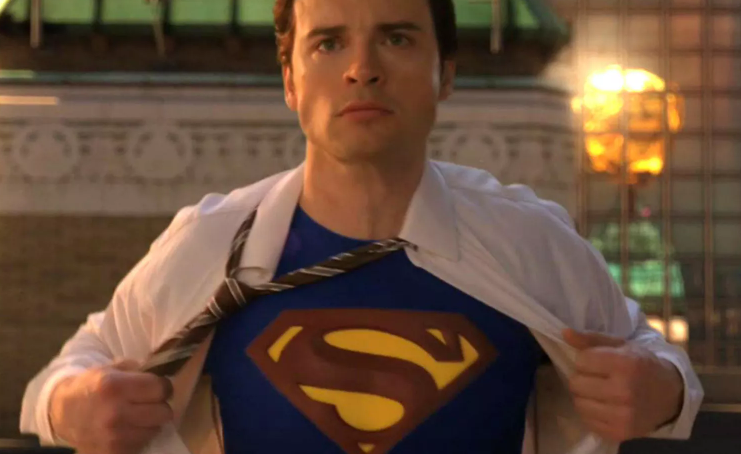 11 Things You Did Not Know About Superman’s Suit 5 Clark Kent is pulling open his white shirt to reveal the classic blue Superman suit.