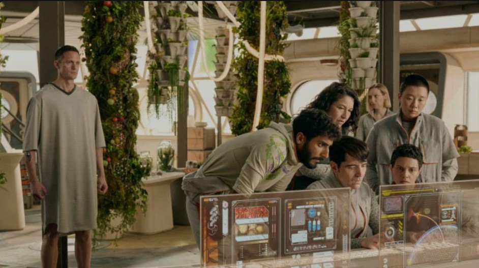 Alexander Skarsgård, Akshay Khanna, Tamara Podemski, Anna Konkle, Sabrina Wu, Tattiawna Jones, and David Dastmalchian in a scene from Murderbot.