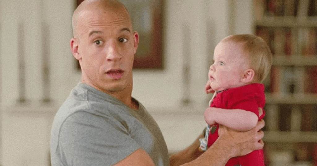5 Best Vin Diesel Movies You Should Watch (Not Including Fast & Furious Franchise) 1 Vin Diesel holding a kid.