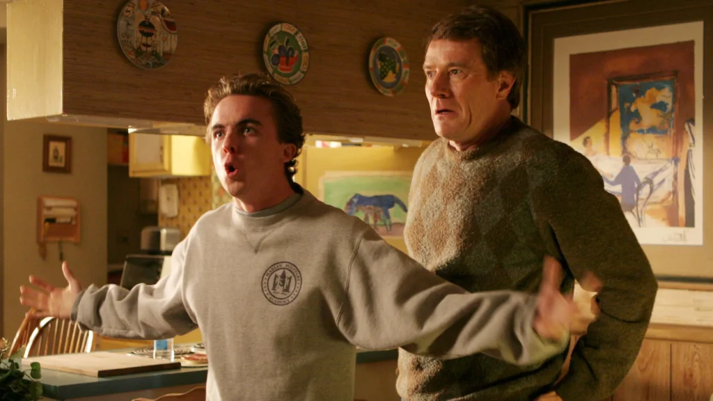 Malcolm in the Middle Creator: Bryan Cranston's Audition Was So Smack-Dab Funny "I literally fell off my metal chair" 3 Malcolm in the middle of an argument as Hal is scared behind him