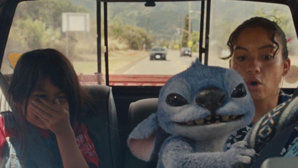 'Lilo & Stitch' Box Office Worldwide: Every Record Broken by Disney's Live-Action Remake 2 Lilo laughing while Stitch and Nani drives the car