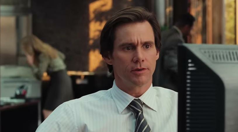 27 Years Ago, NCIS Actor Sasha Alexander Starred in a $223M Jim Carrey Cult-Hit That Still Remains a Banger 2 Jim Carrey as Carl looking at the computer in Yes Man.
