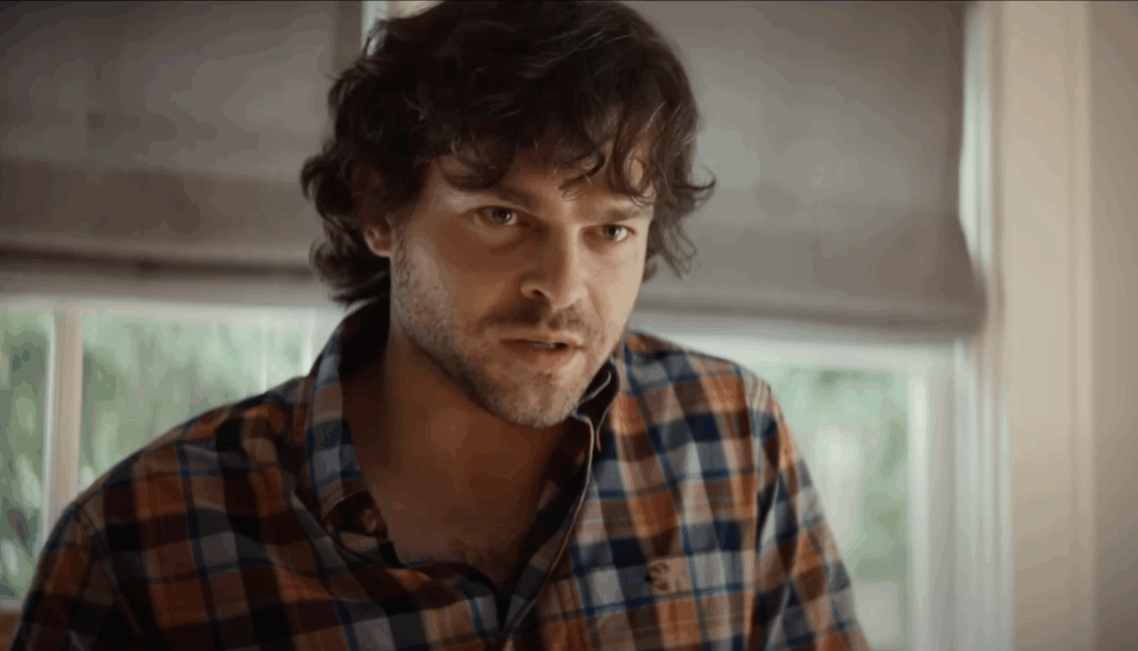This Mystery Character in Ironheart Looks Like the Son of Robert Downey Jr’s Iron Man Villain 2 Alden Ehrenreich in a chequed shirt.