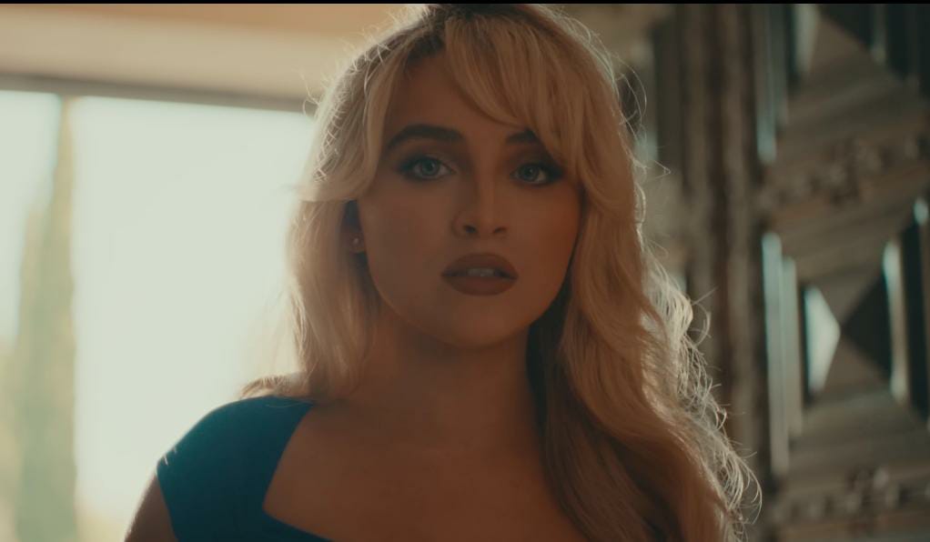 Sabrina Carpenter’s ‘Man’s Best Friend’ Fails to Make It to the Grammys’ 34 Most Iconic Album Covers 1 Sabrina Carpenter, in a blue top, looks shocked.
