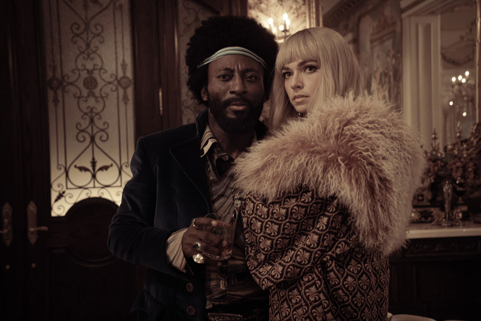 A still from Star Trek: Strange New Worlds Season 3 featuring M'Benga and Chapel in 1960s inspired outfits