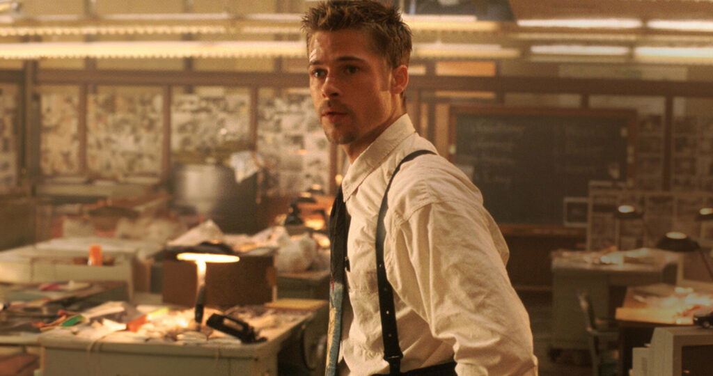 Brad Pitt, in a white shirt in Se7en.