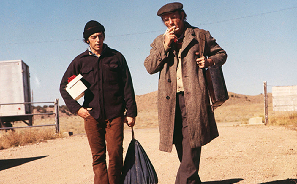 10 Overlooked Al Pacino Movies That Deserve More Attention 1 Al Pacino and Gene Heckman walking down an empty road