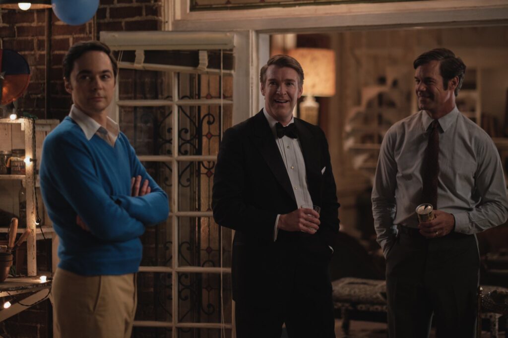 Jim Parsons and Michael standing with folded hands in a still from The Boy in the Band.