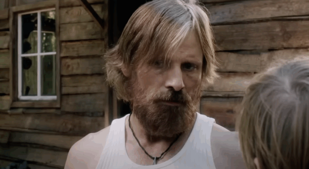 7 Best Viggo Mortensen Movies That Proved He’s More Than Aragorn 4 Viggo Mortensen's Ben in long hair and full beard.