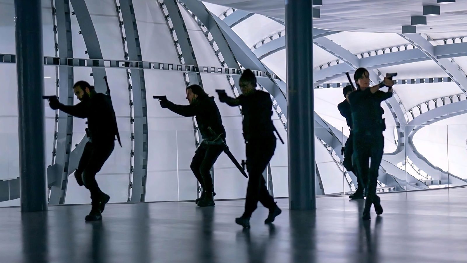 A team holds guns