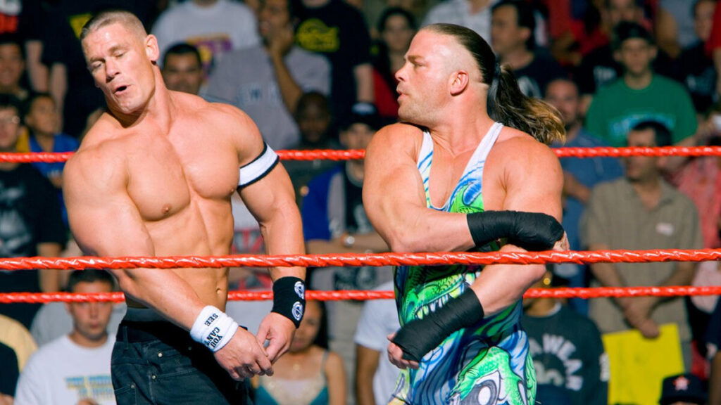 John Cena and Rob Van Dam amid a match