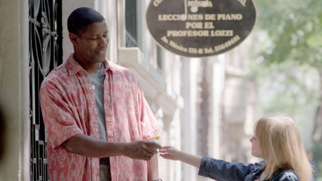 25 Interesting Movies with RT Score Below 50% 32 Lupita giving flower to John