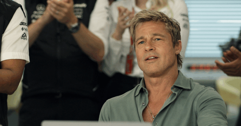 Brad Pitt talking to someone.