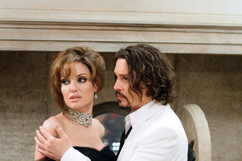 Angelina Jolie and Johnny Depp as Elise and Frank in a still from The Tourist