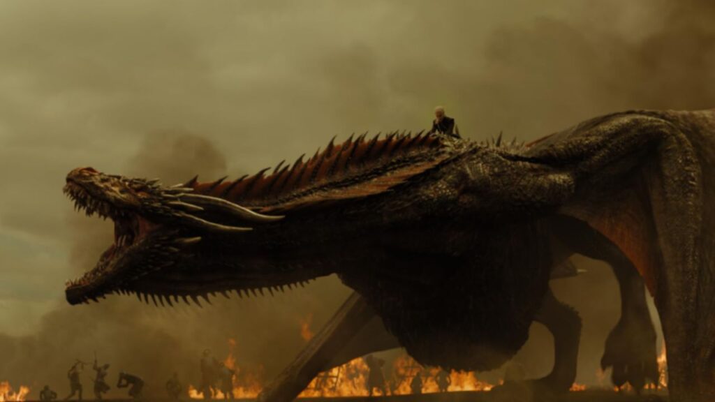 Daenerys riding on her dragon as he roars