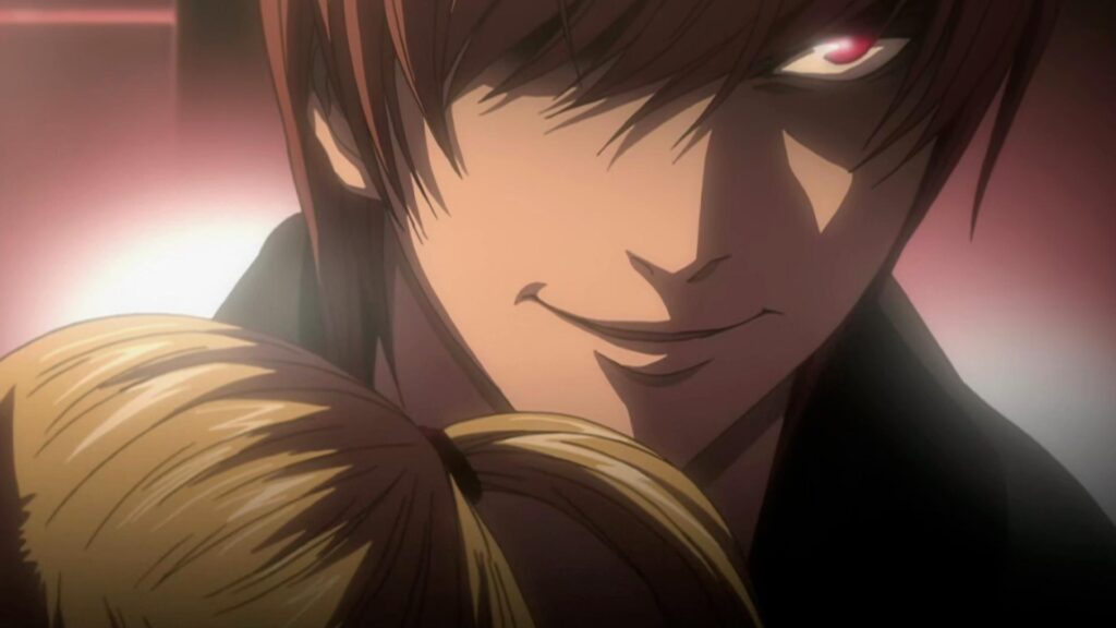 Light has an evil smile on his face as he hugs misa in Death Note