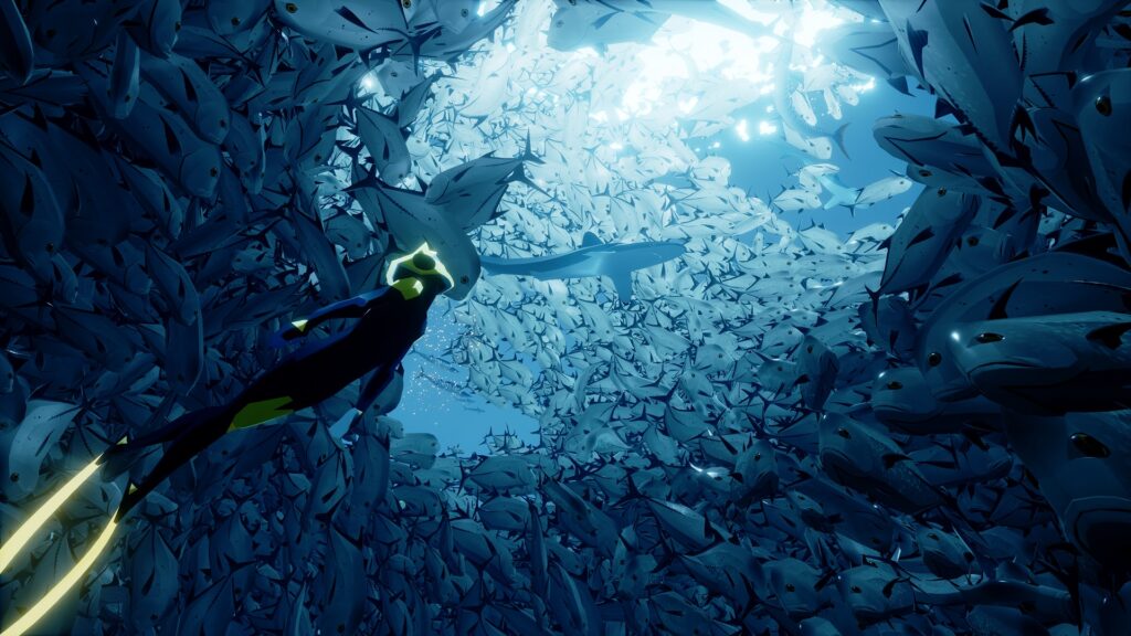 Top 10 Video Games Published by Wuchang: Fallen Feathers’ Publisher 505 Games 8 ABZU screenshot featuring the diver swimming through schools of fish.