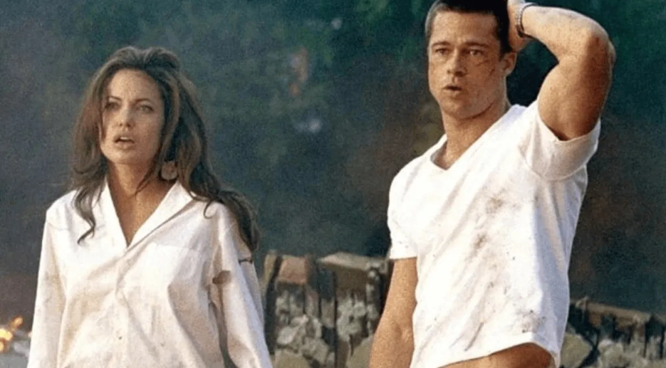Brad Pitt and Angelina Jolie looking disheveled in a scene from Mr. & Mrs. Smith. 