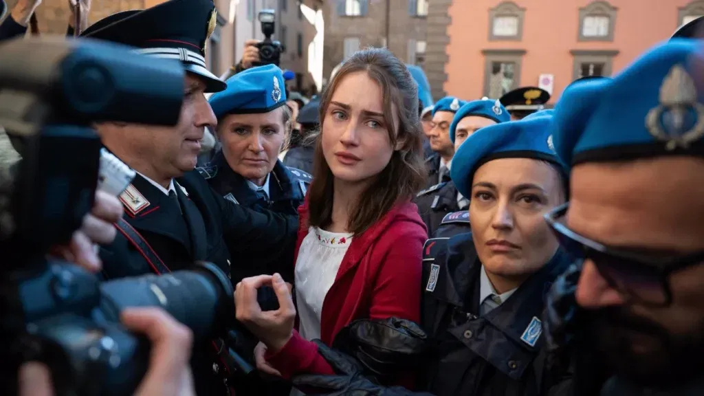 What She Does for a Living? 8 Conviction scene from Hulu's limited series on Amanda Knox.