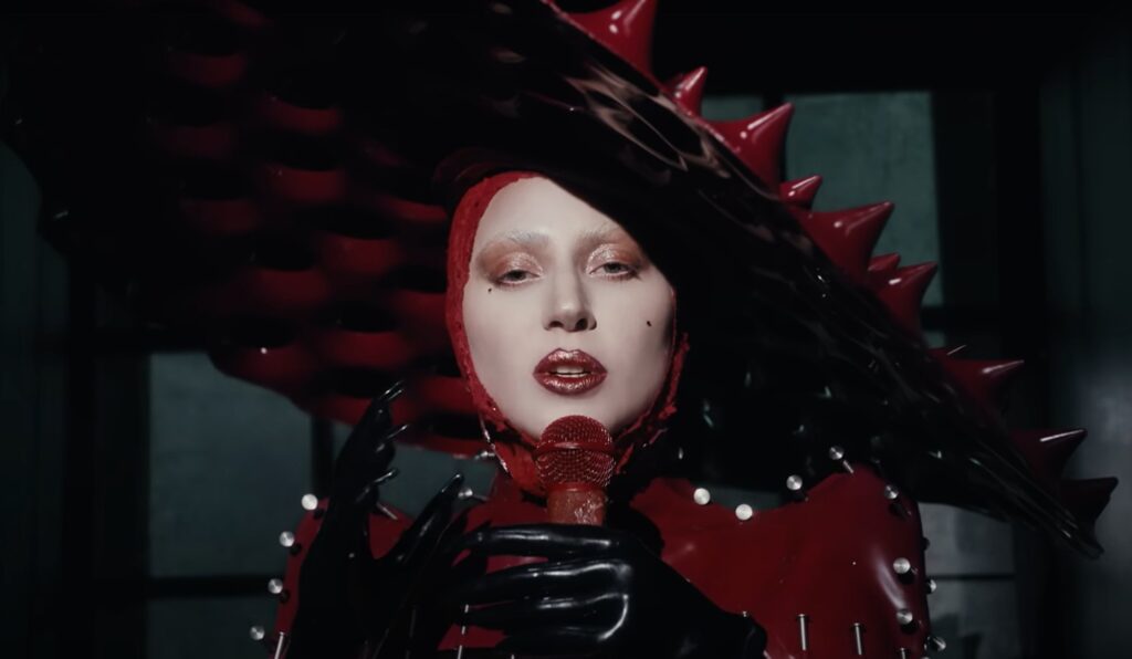 VMAs 2025: Kendrick Lamar, Sabrina Carpenter, Bruno Mars, and Other Artists With Most Nominations 1 Lady Gaga in a still from Abracadabra music video