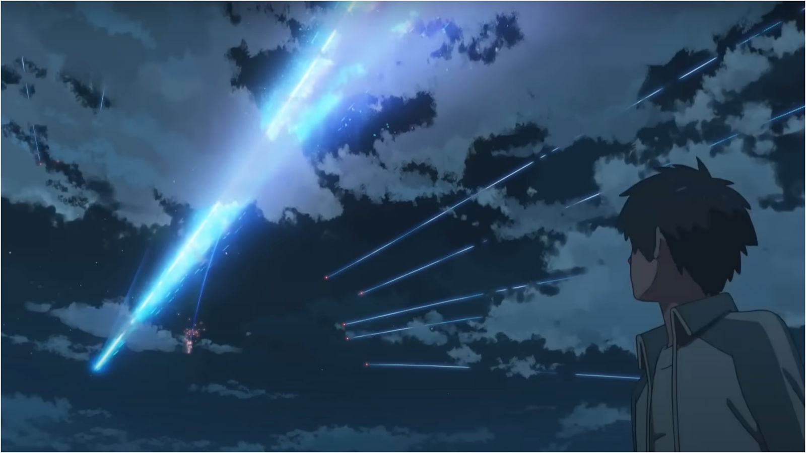 Taki is looking at the meteor in the sky in Your Name. 