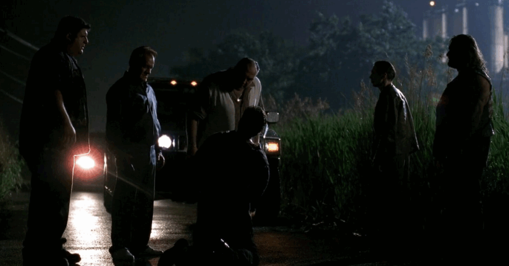 10 Best The Sopranos Episodes That Makes It Better Than Breaking Bad 7 The crew surrounding someone who is on their knees.