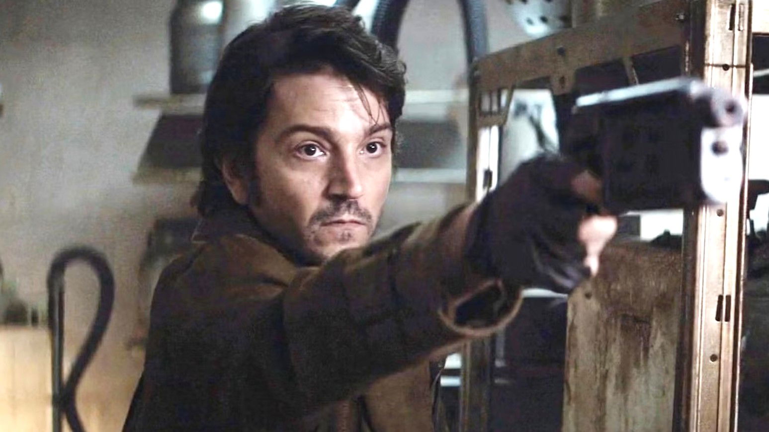 diego luna holding a gun in andor