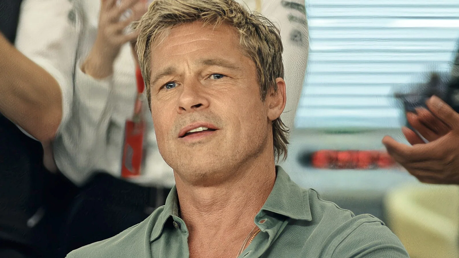Brad Pitt looking at something in his 2025 movie F1.