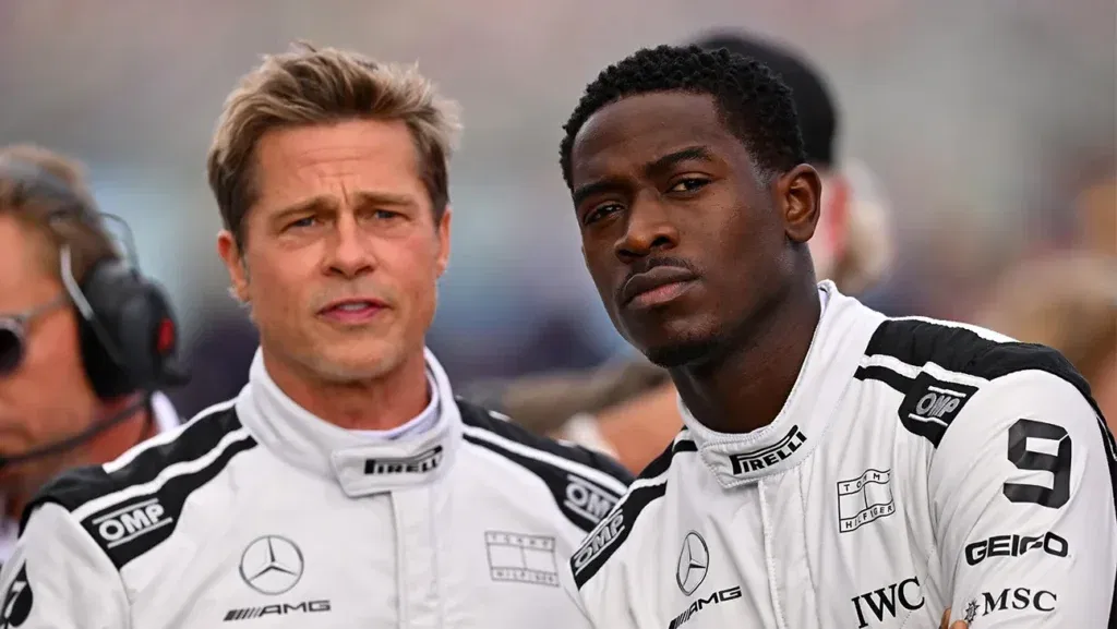 Brad Pitt and Damson Idris standing side by side in F1.
