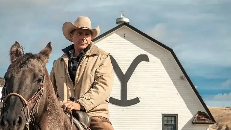 Yellowstone featuring John Dutton on a horse scene