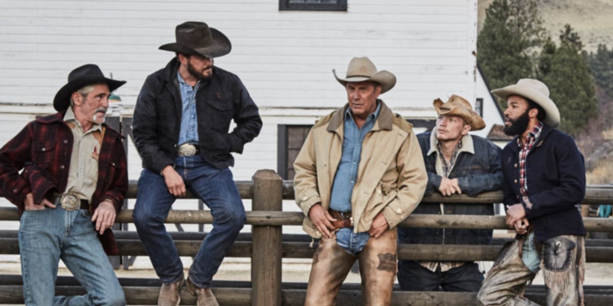 John Dutton with his ranch hands lounging around in their cowboy hats