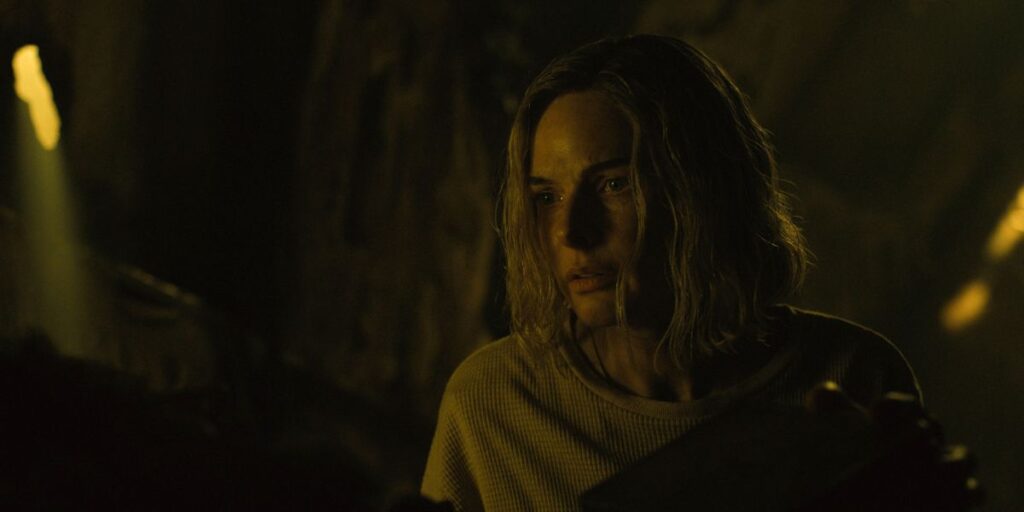 Rebecca Ferguson looking scared in Silo