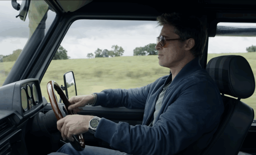 Brad Pitt driving a car