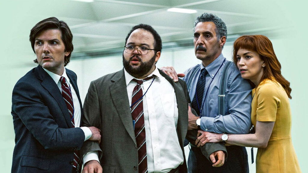 Apple TV show Severance cast, holding onto each other. 