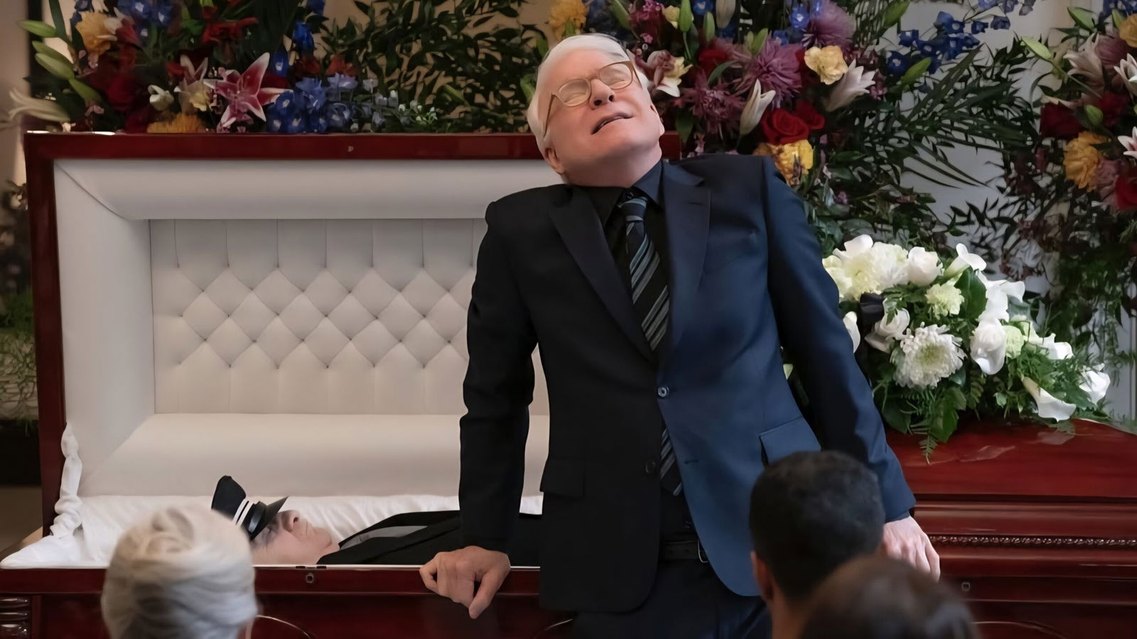 Man cries at a funeral