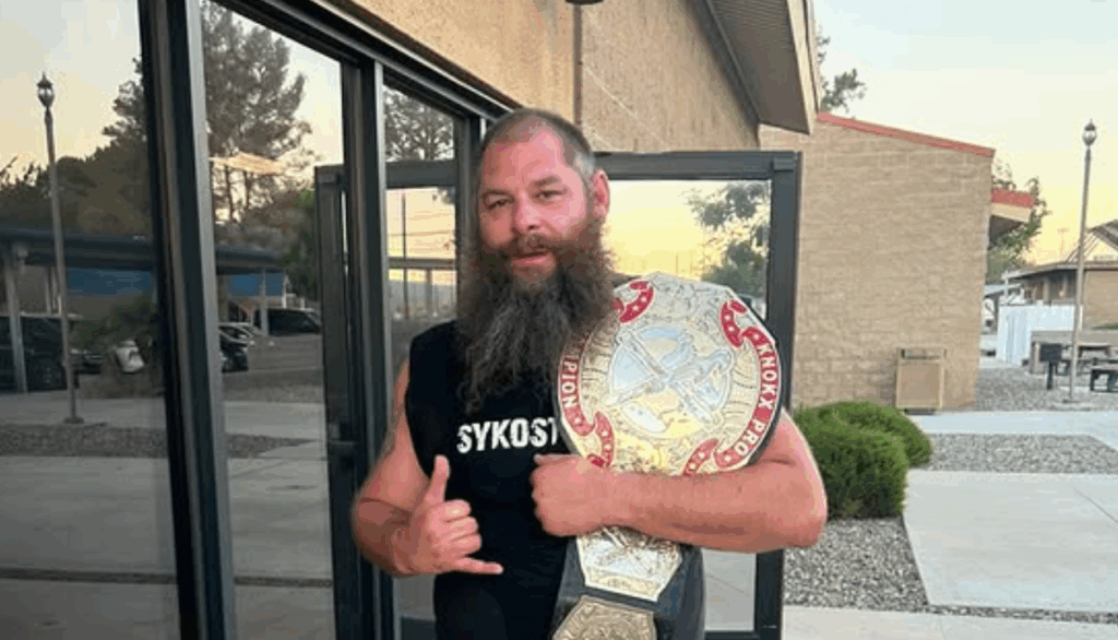Syko Stu with a championship