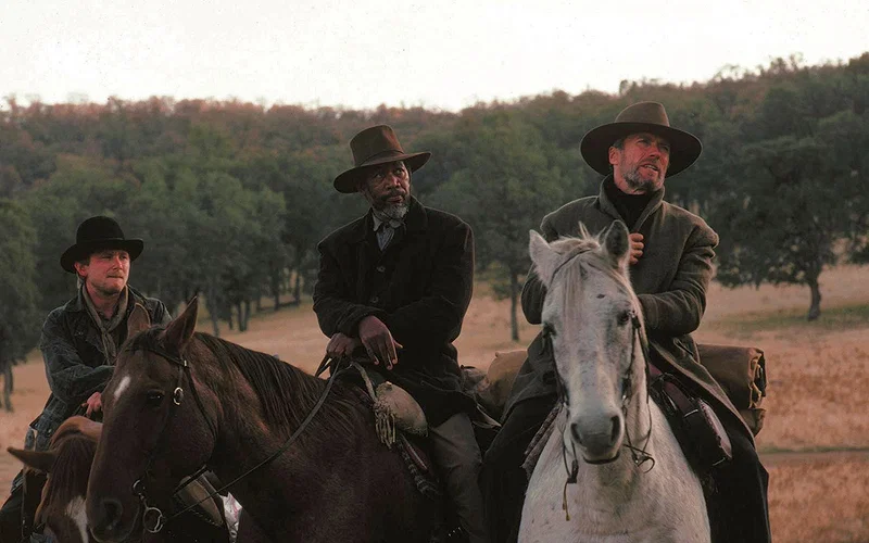Clint Eastwood sitting atop a horse