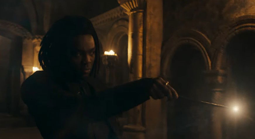 Snape using his wand 