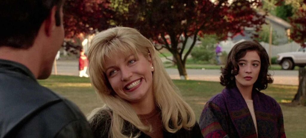 "I have no desire": The David Lynch Movie That Made Quentin Tarantino His Biggest Hater 2 A character smiling and looking charmingly in Twin Peaks: Fire Walk with Me