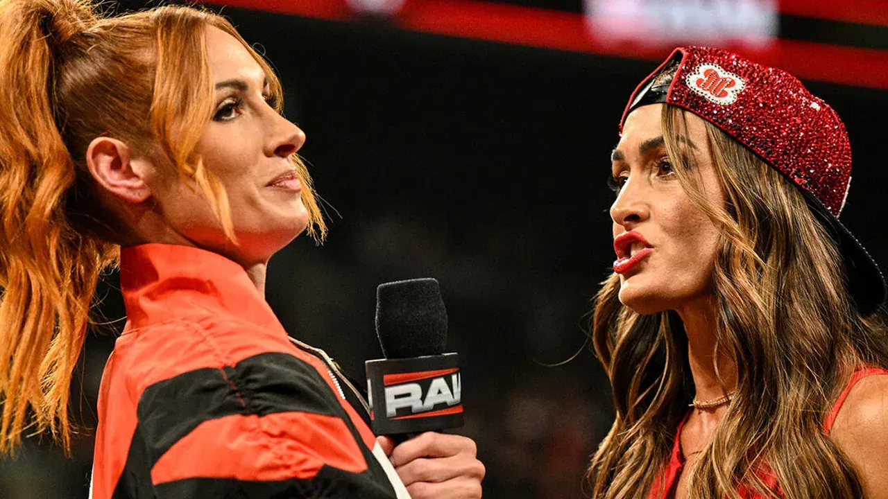 Nikki Bella confronting Becky Lynch. 