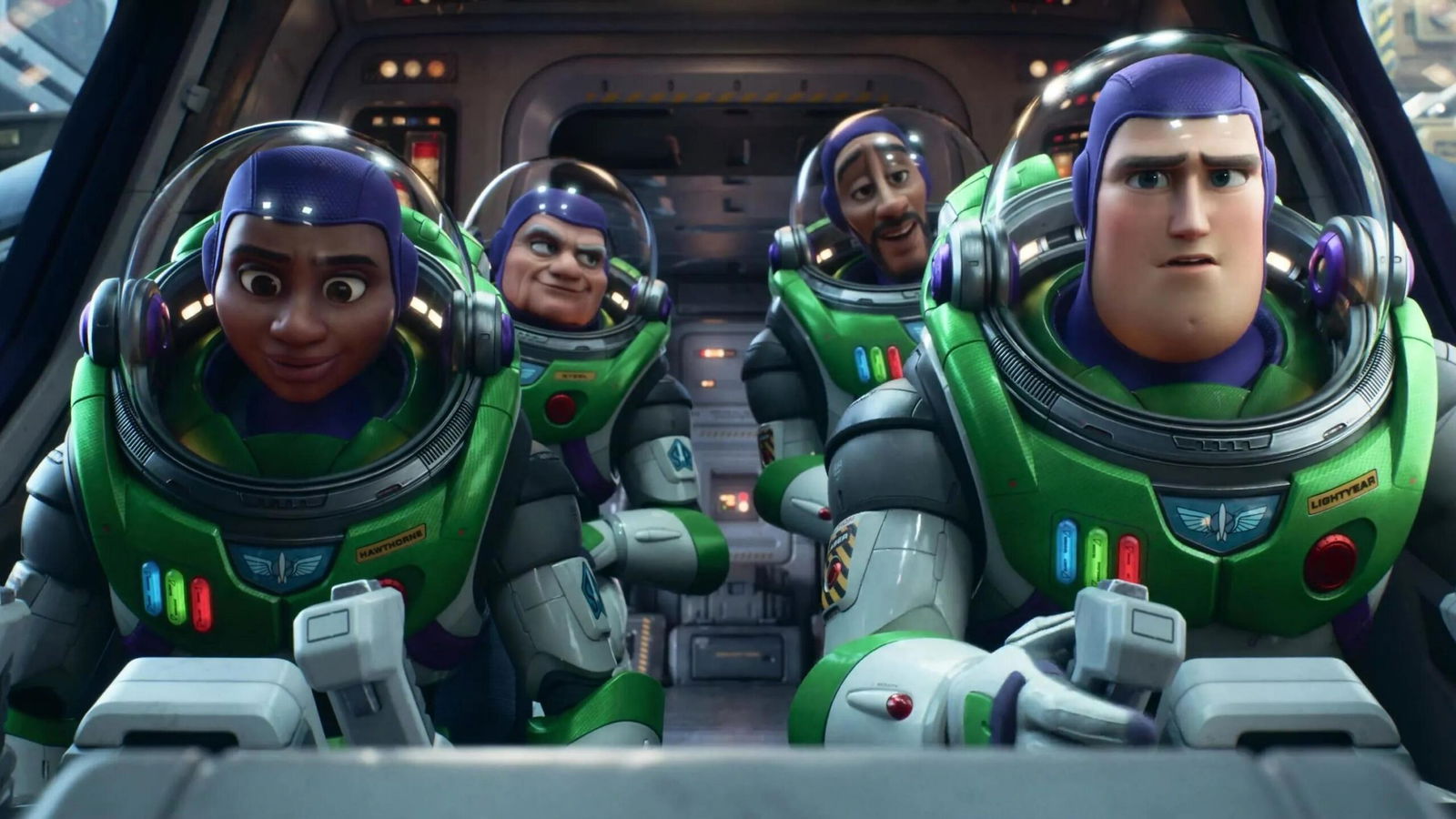 Four space rangers in matching green and white suits sit in spacecraft seats, including Buzz Lightyear on the right and Alisha Hawthorne on the left.