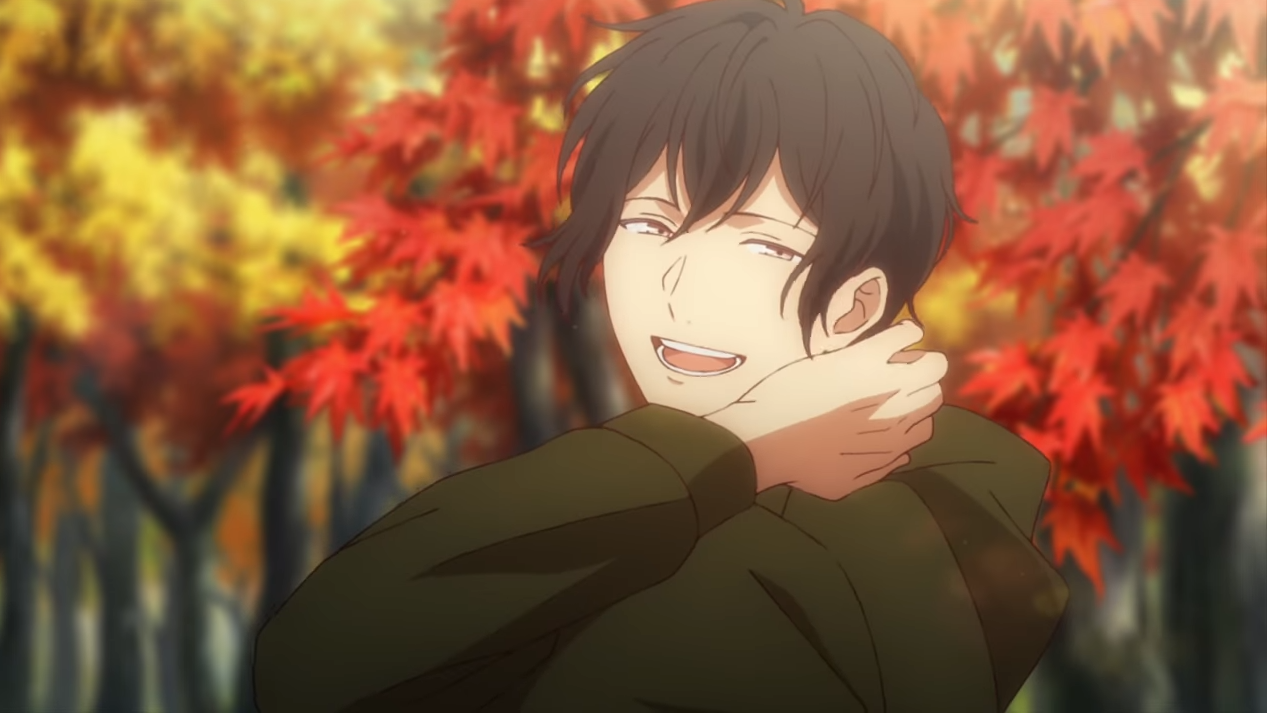 Ugetsu Murata with dark hair smiling warmly while embracing himself, with autumn foliage creating a colorful orange and red background.