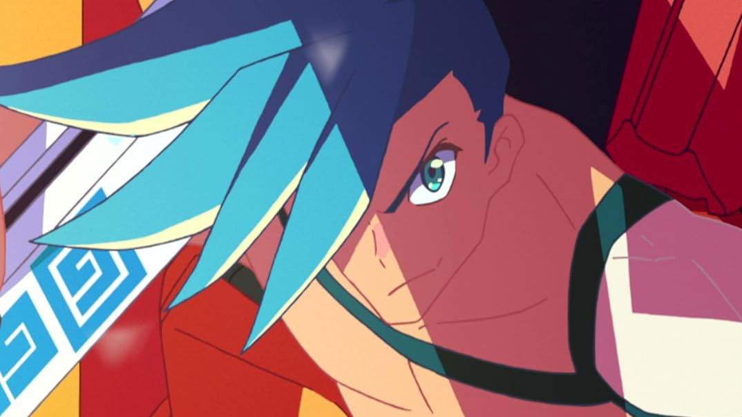 Close-up of Galo Thymos with teal-colored hair and intense expression, shown in profile with vibrant geometric shapes and colors in the background.