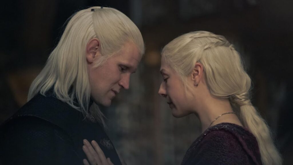 Rhaenyra and Daemon holding each other in a scene from House of the Dragon