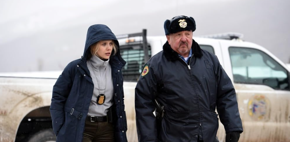 Graham Greene and Elizabeth Olsen in Wind River 