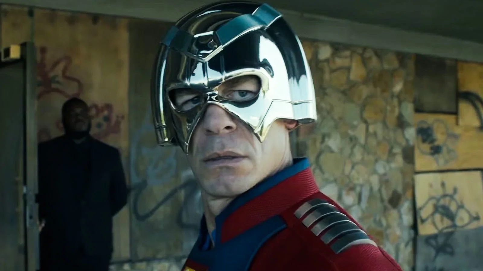 Peacemaker wearing his helmet