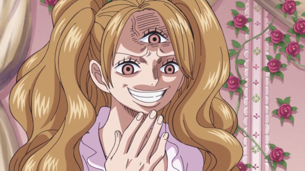 Pudding's evil smile in One Piece. 